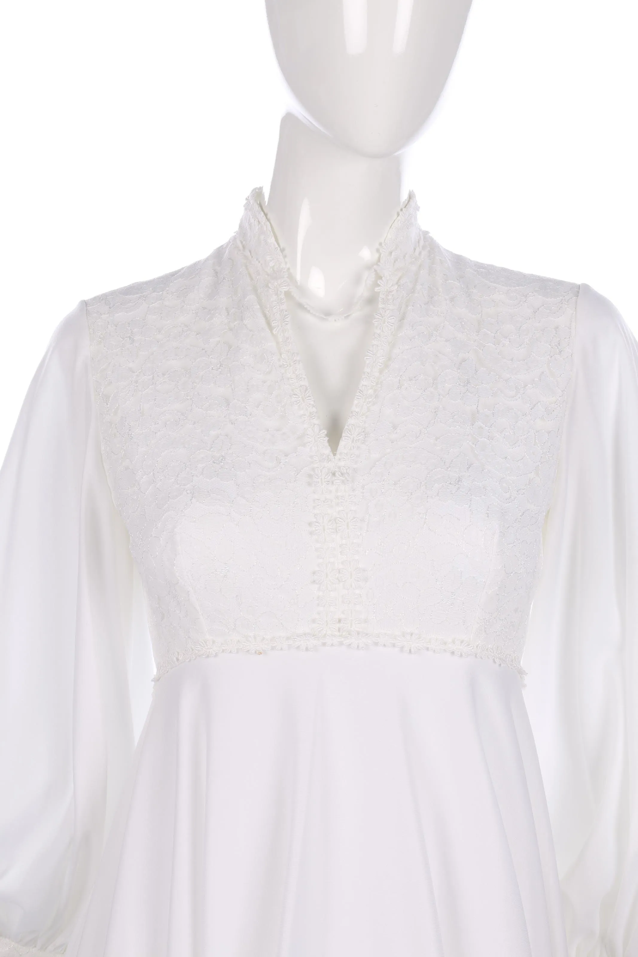 Vintage white wedding dress with flower lace and cuffed sleeves